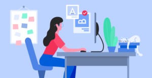 Traductor sentado en su escritorio trabajando con su ordenador.